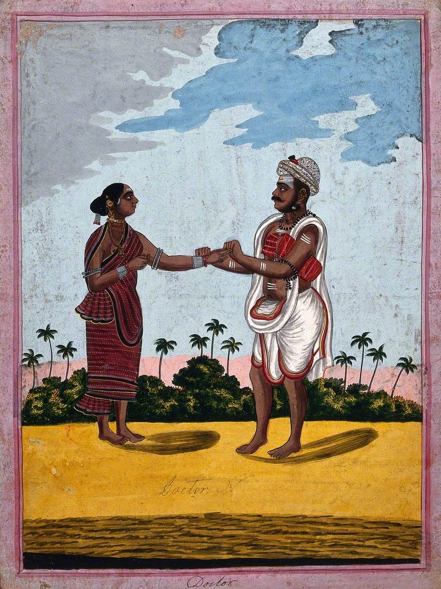 Indian Doctor Taking the Pulse of a Patient