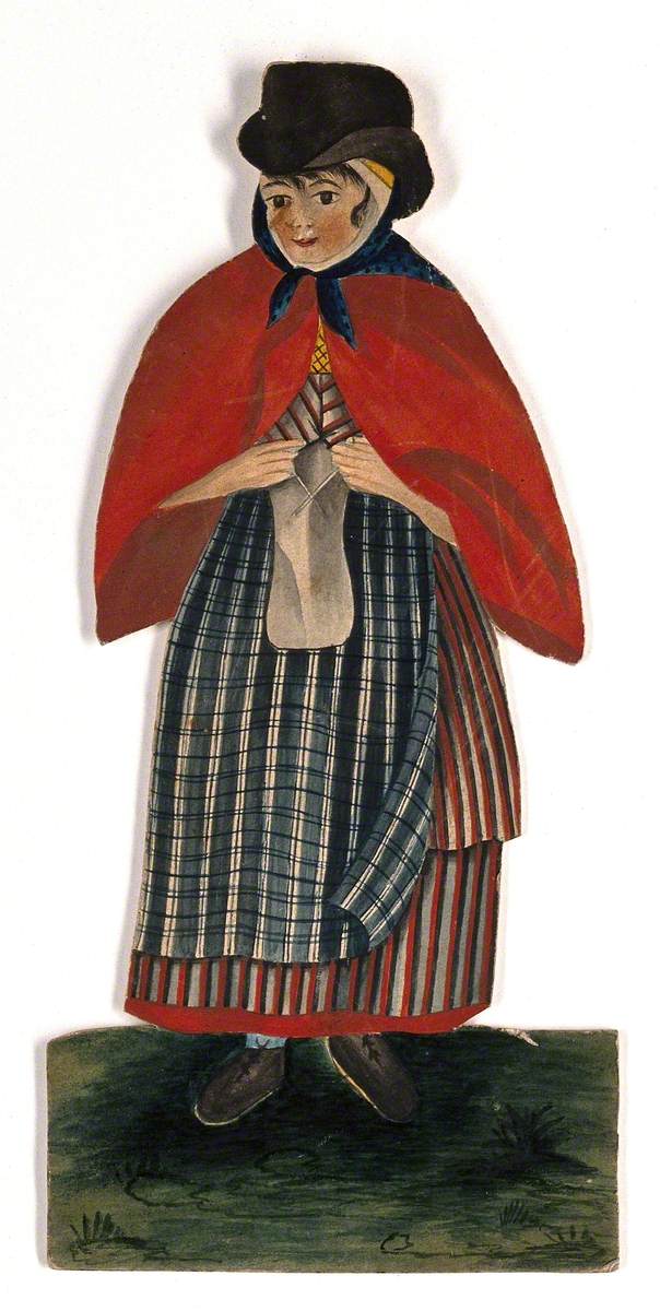 A Country Woman Wearing Hat and Red Cloak