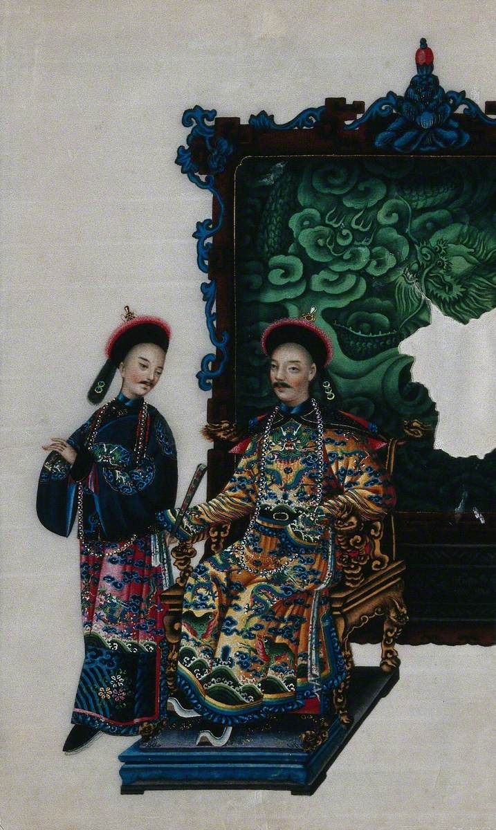 A High-Ranking Chinese Official Seated on a Double-Headed Dragon Chair with Attendant, Both Dressed in Richly Patterned Silks