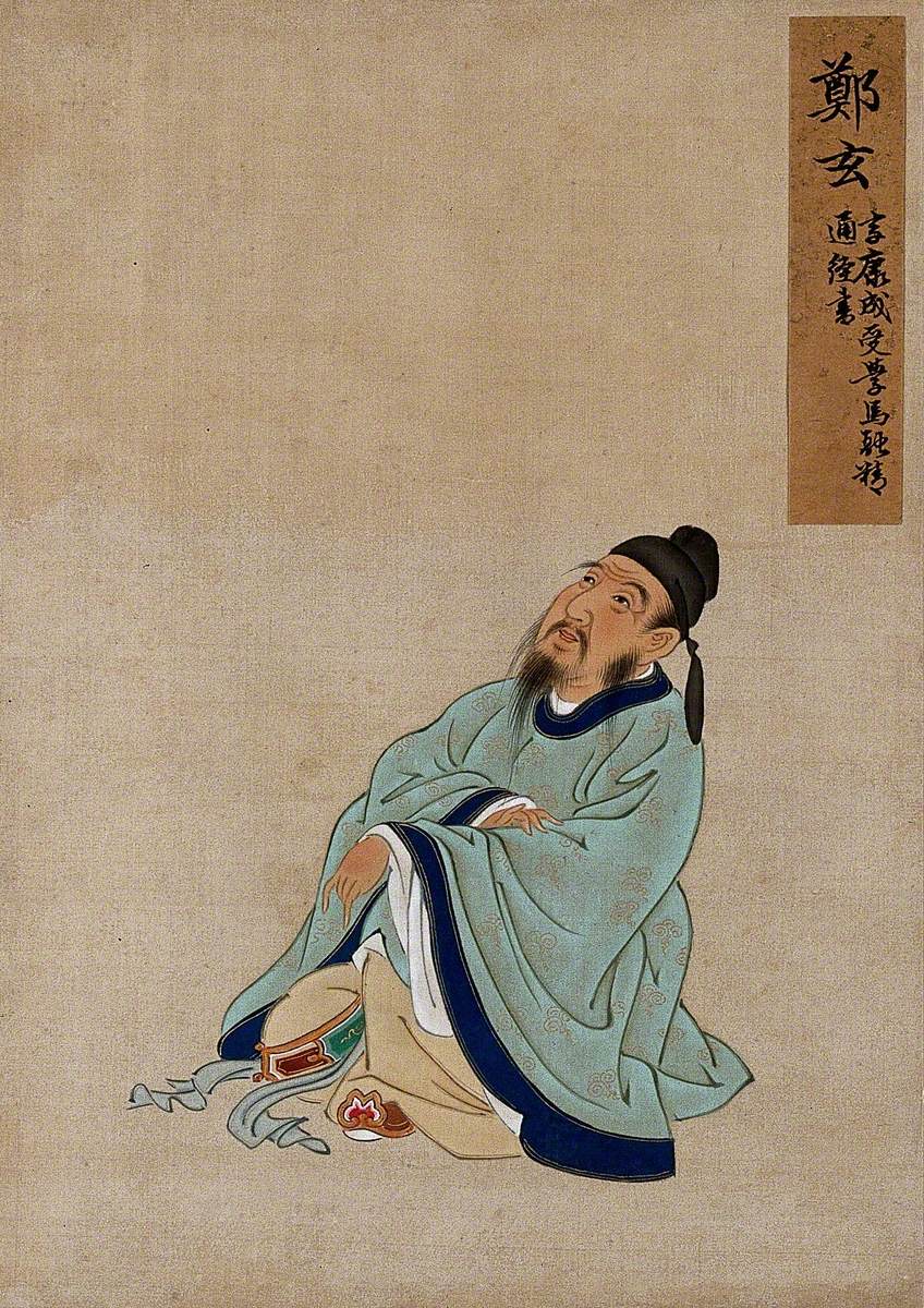 A Seated Chinese Figure Wearing Pale Turquoise Coloured Silk Robes with an Indigo Border and Buff Undergarments