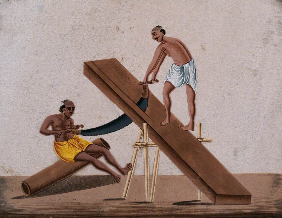 Two Men Sawing a Large Block of Wood