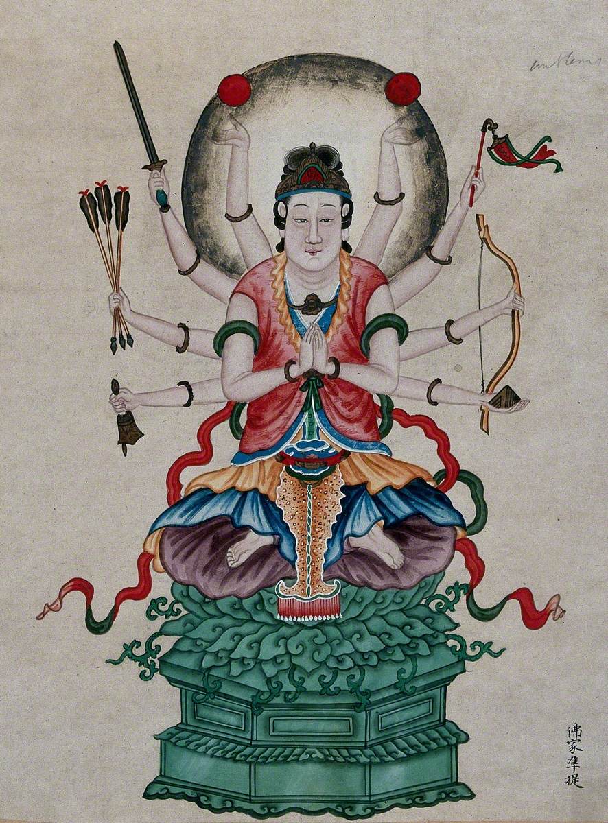 A Chinese Deity Kuan Yin, Seated in the Lotus Position on a Jade Throne, with Ten Arms Carrying Weapons, a Bell and Round Objects