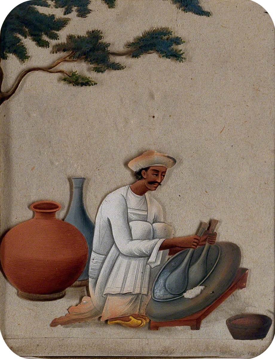 A Man Pounding (?) with Pestle Type Equipment in Both Hands