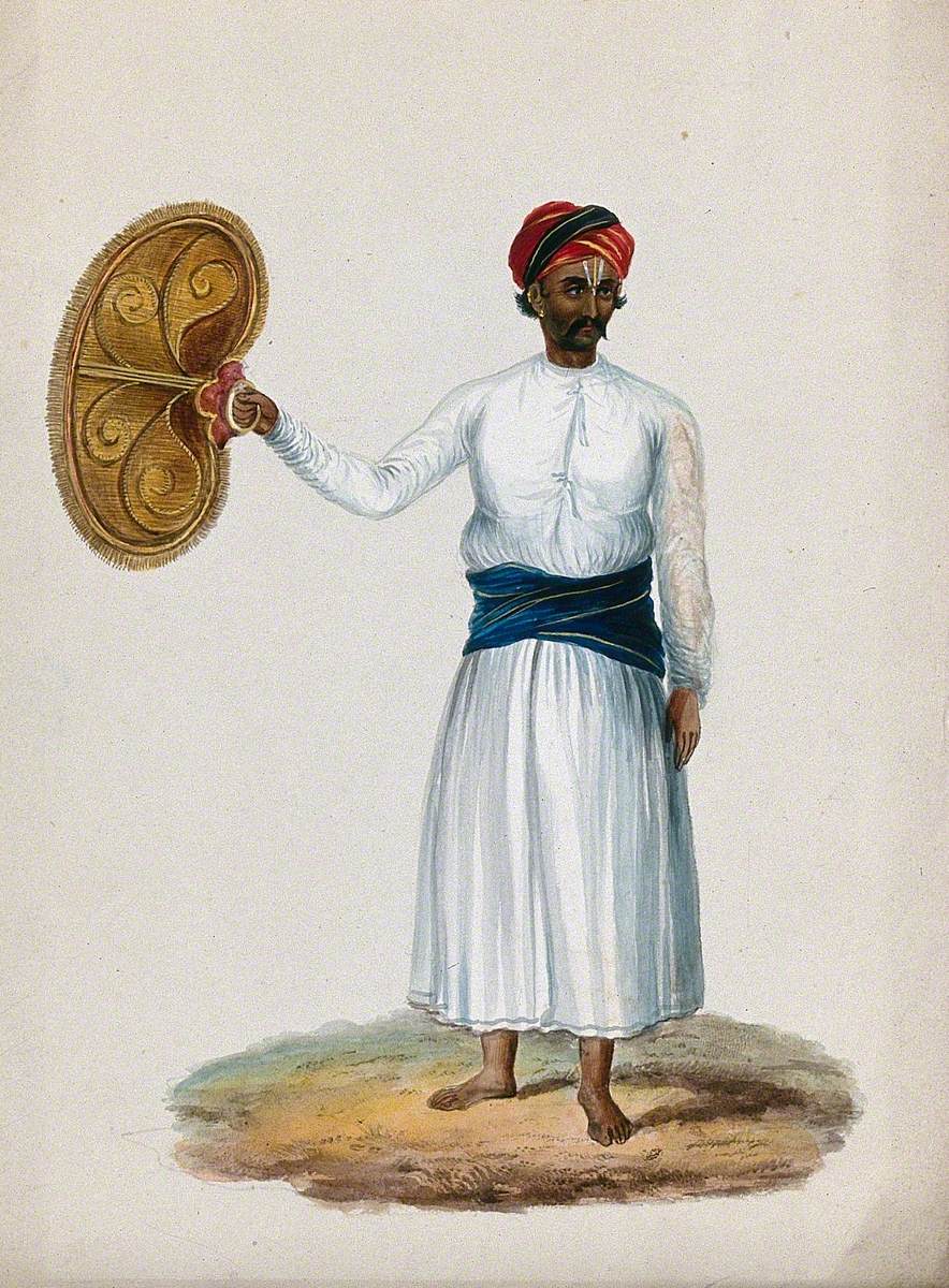 An Attendant Holding a Fan