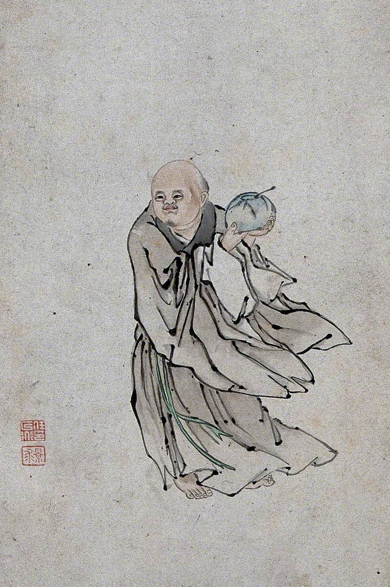 A Chinese Man Holding a Bowl Containing a Spoon