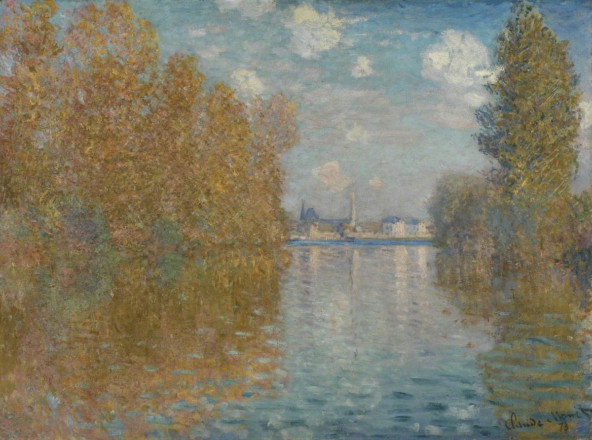 Claude Monet's sunny landscape painting of open water lined with trees turning yellow and the town of Argenteuil in the distance.