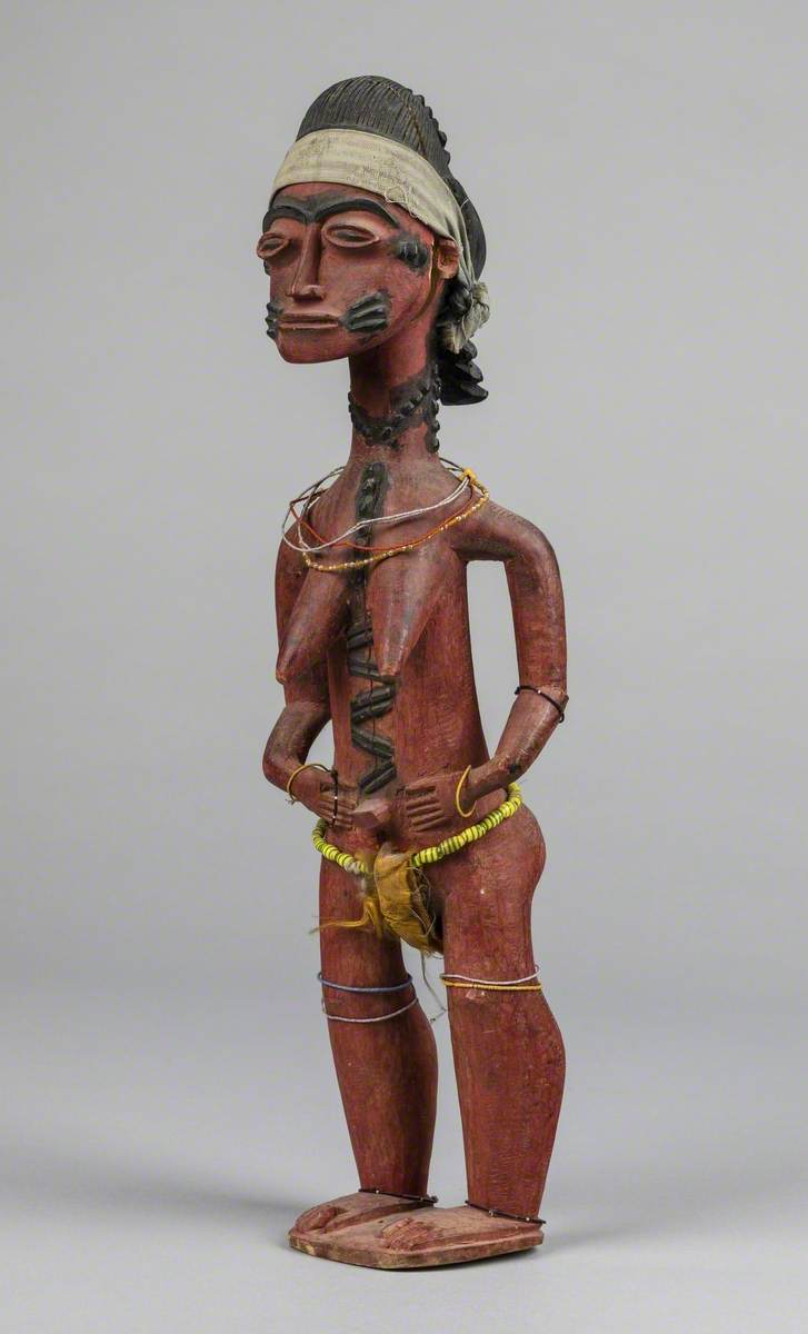 Female Figure Wearing Beads*