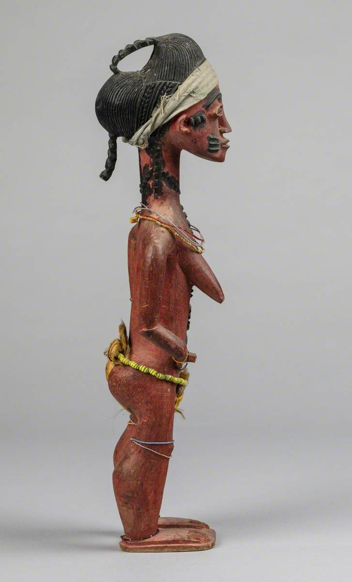 Female Figure Wearing Beads*