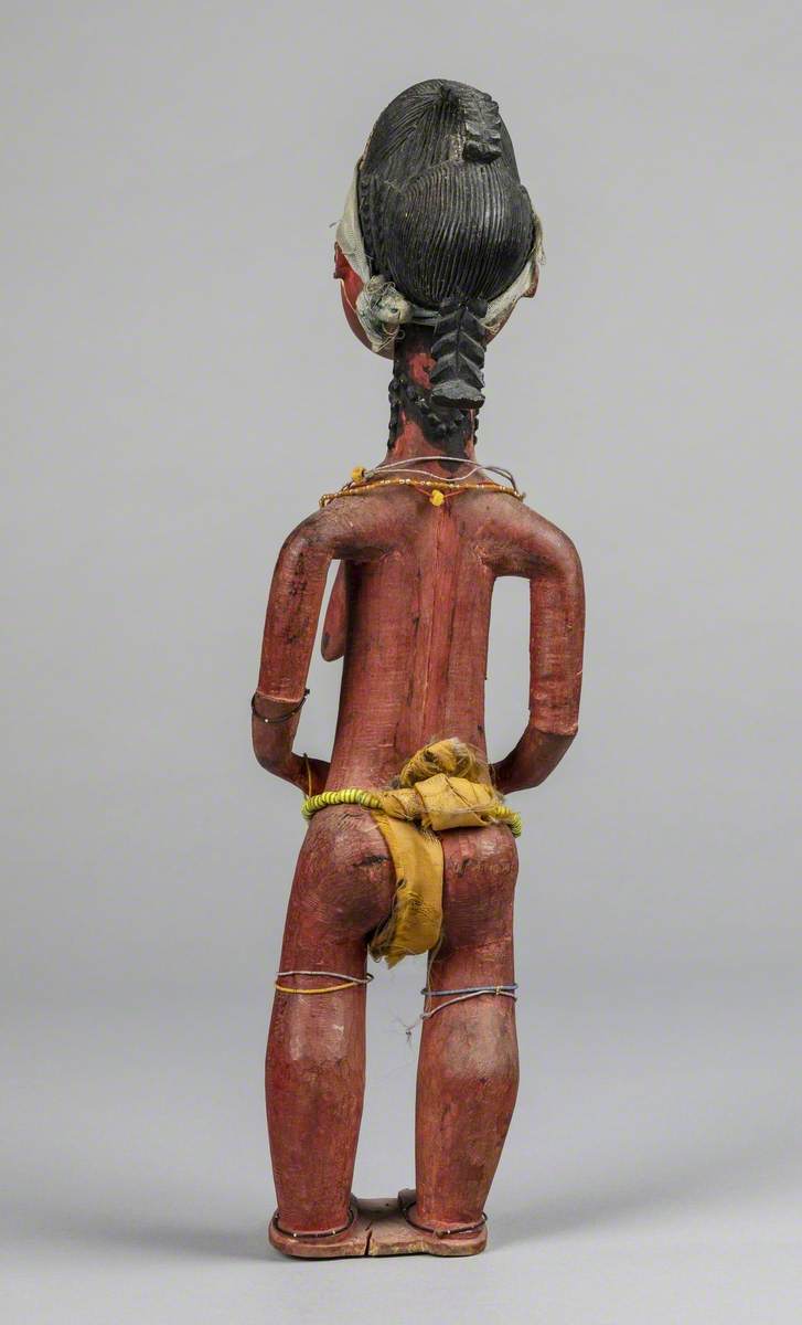 Female Figure Wearing Beads*