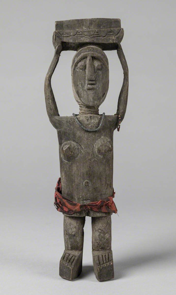 Woman Carrying an Adaka*