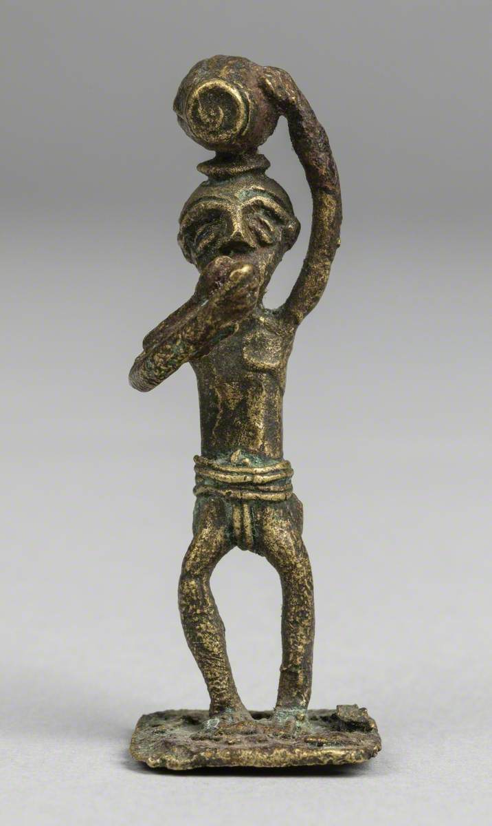 Man Smoking a Pipe*