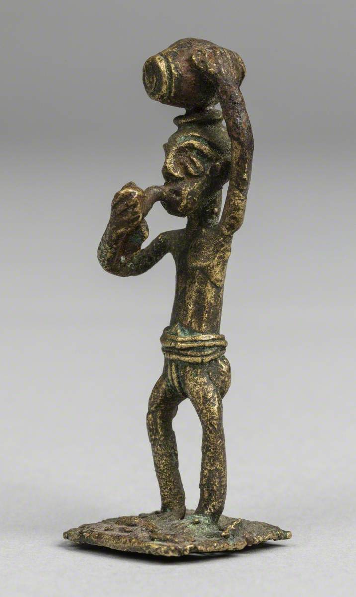 Man Smoking a Pipe*