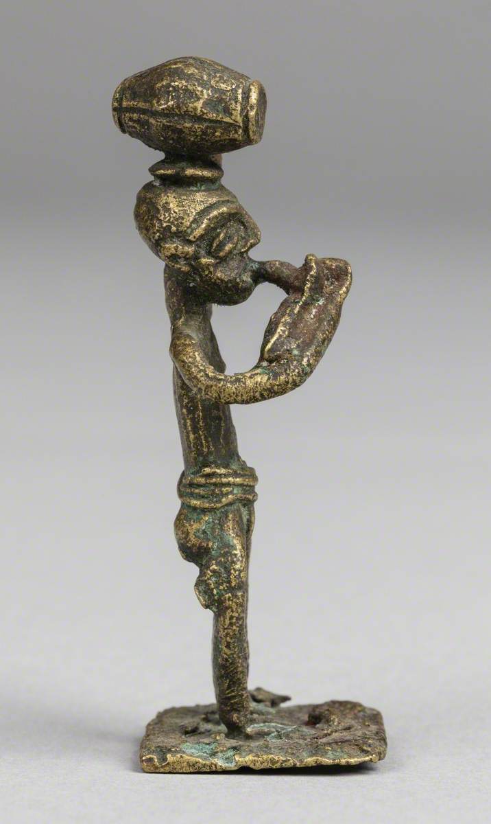 Man Smoking a Pipe*