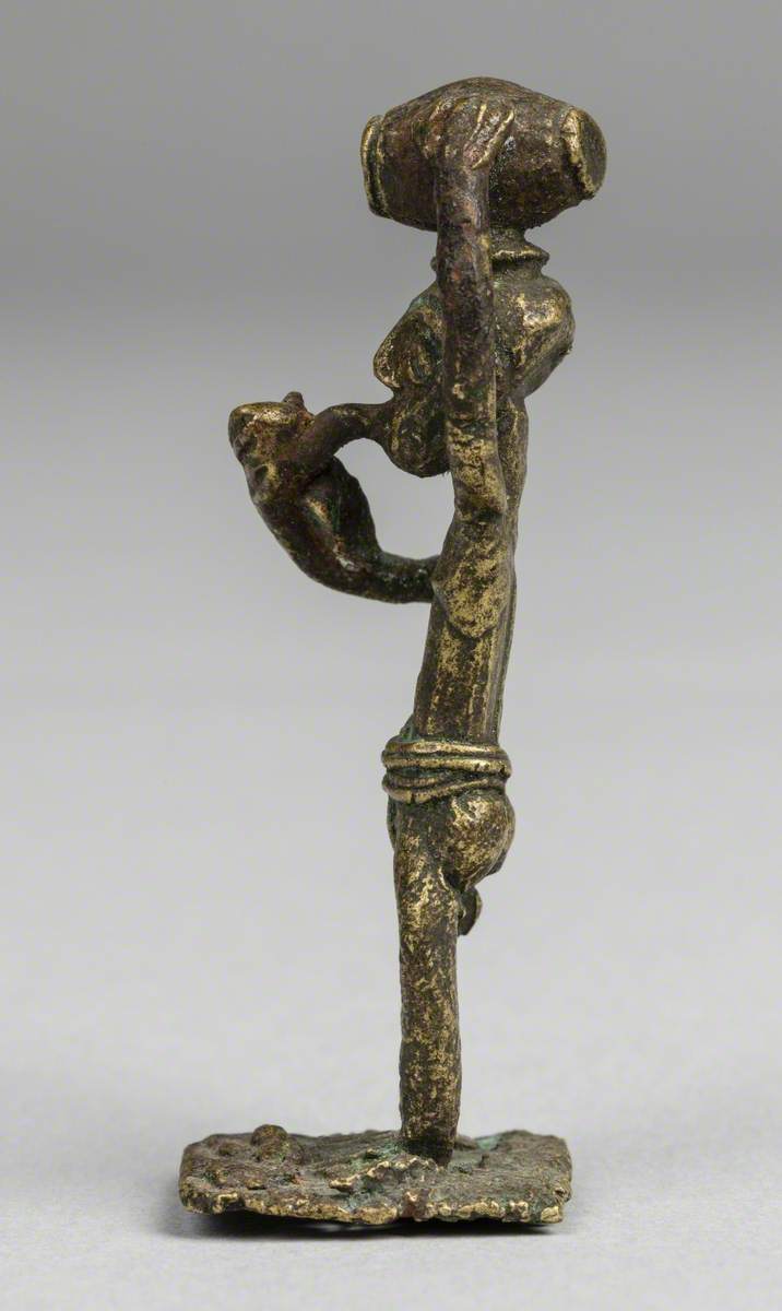 Man Smoking a Pipe*