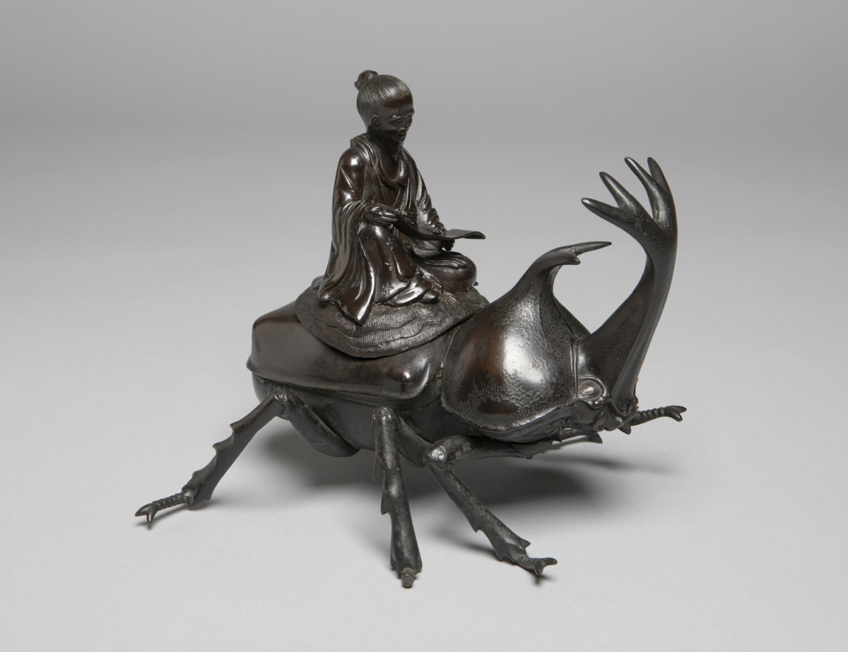 Okimono of a Chinese Sage or the Deity Jurojin Riding a Rhinoceros Beetle