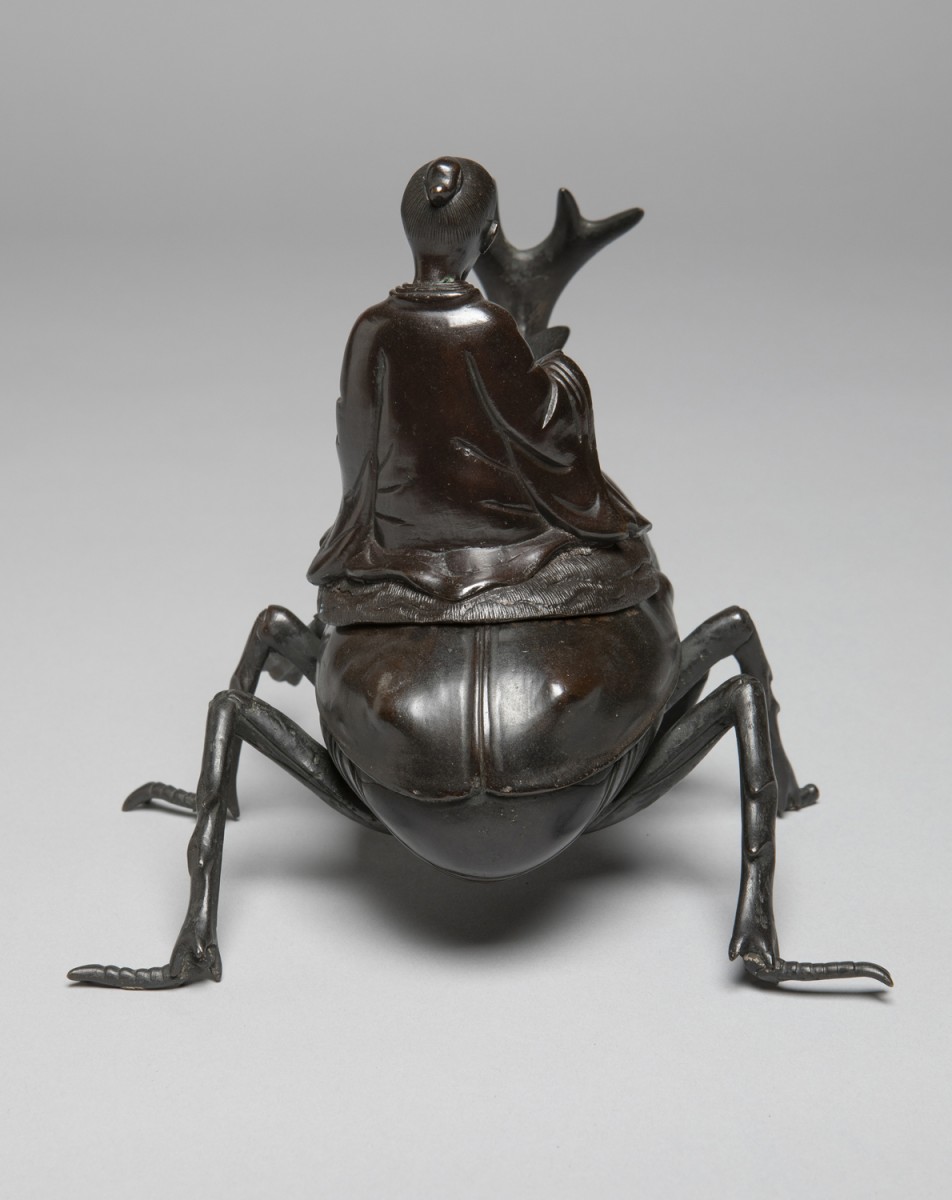 Okimono of a Chinese Sage or the Deity Jurojin Riding a Rhinoceros Beetle