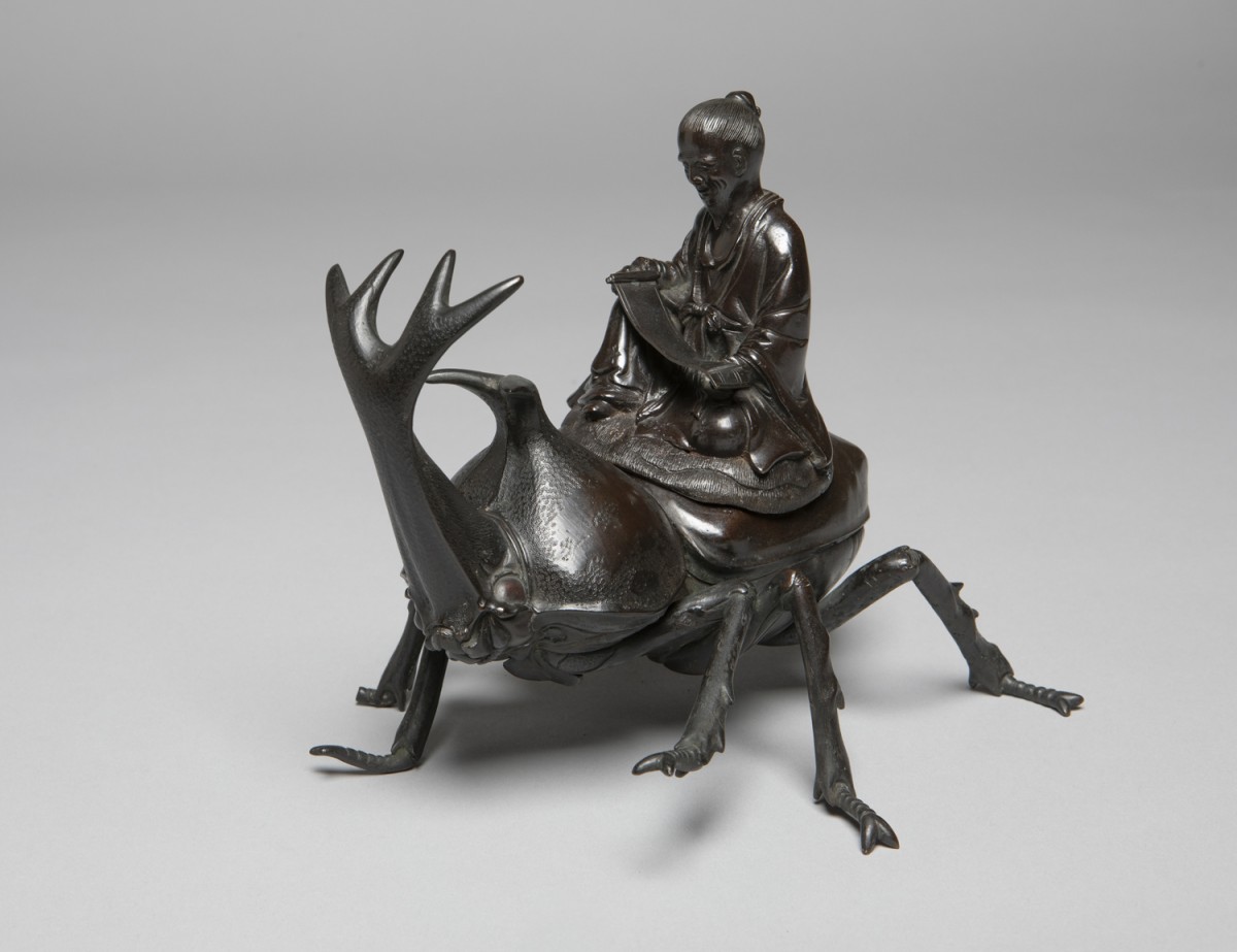 Okimono of a Chinese Sage or the Deity Jurojin Riding a Rhinoceros Beetle