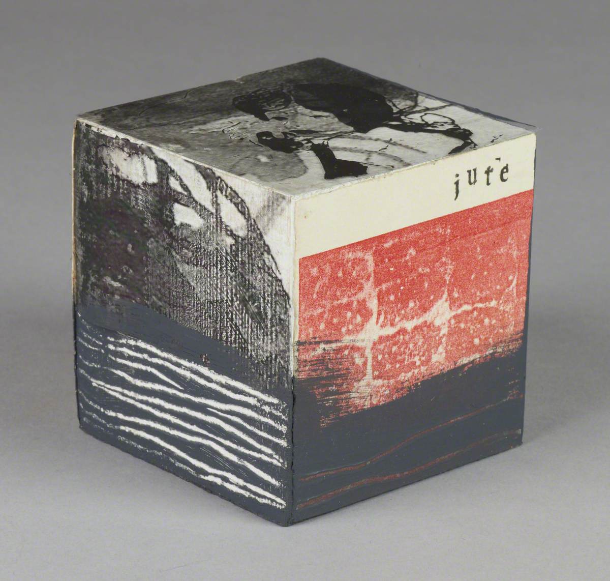 121 Linked Cubes: Cube with an Acetate Film Image of a Girl and Stencilled 'Jute'