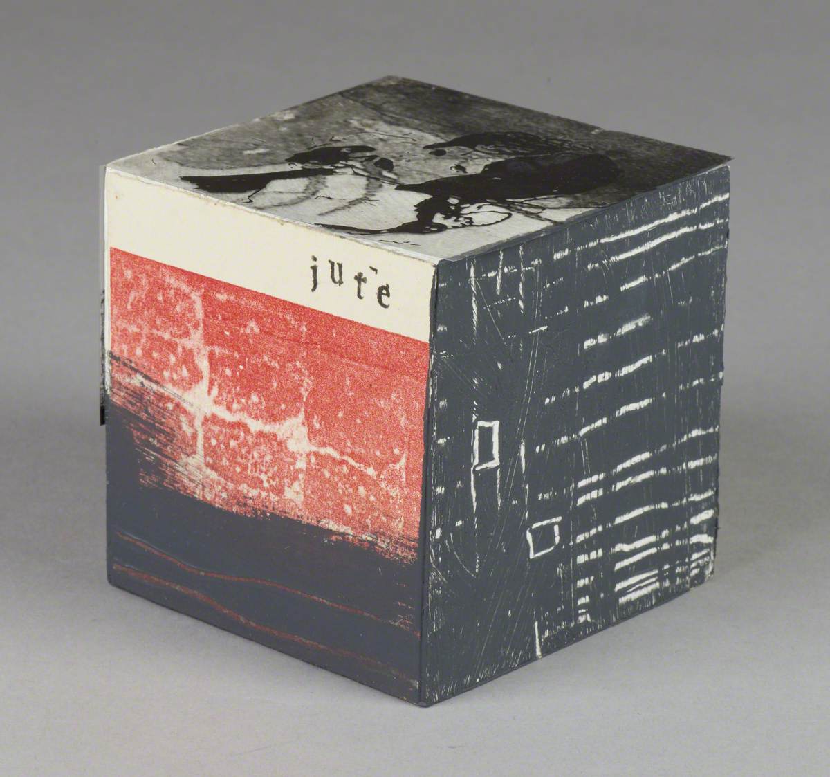 121 Linked Cubes: Cube with an Acetate Film Image of a Girl and Stencilled 'Jute'