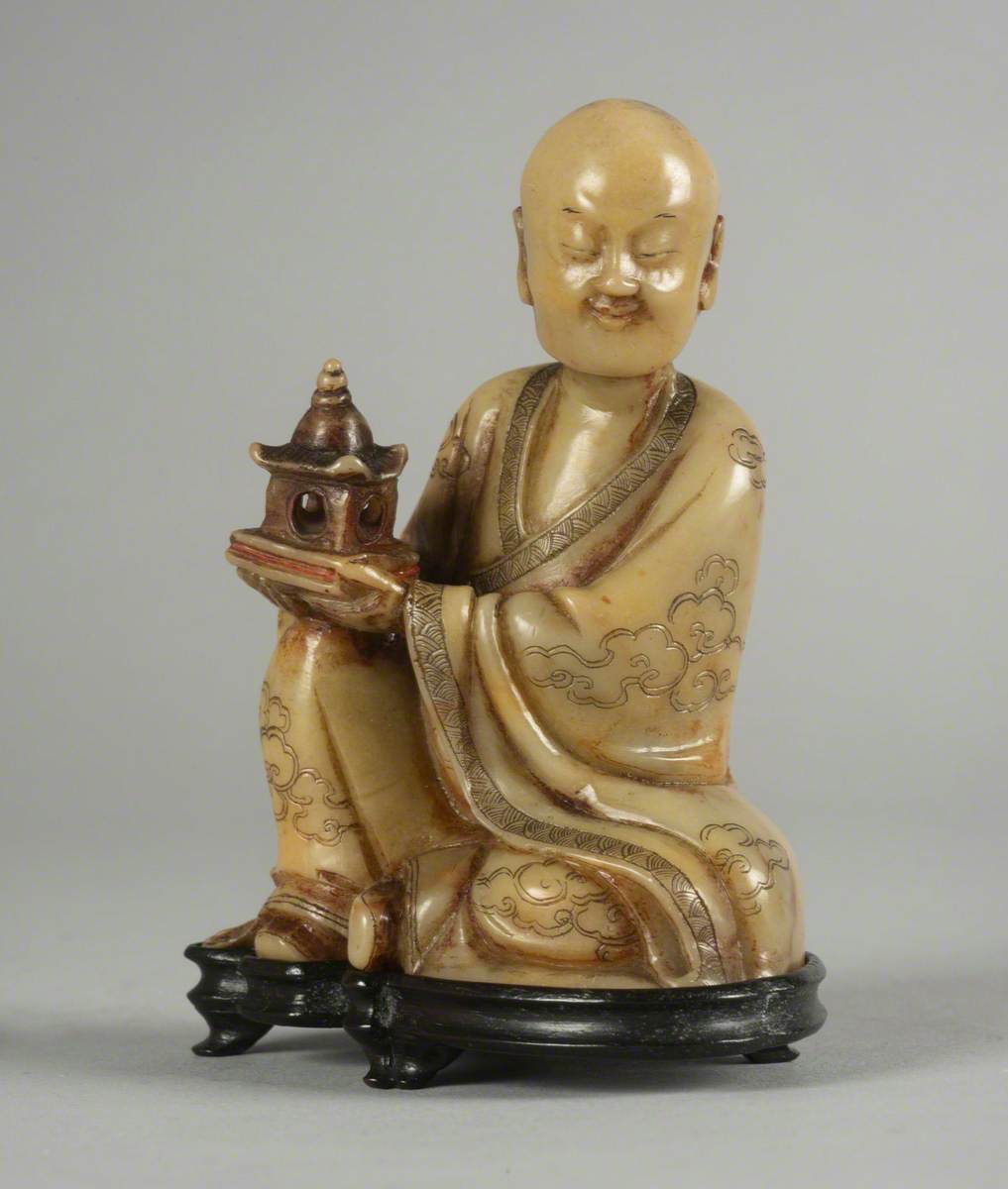 Seated Luohan (Disciple of the Buddha) Holding a Model of a Pagoda