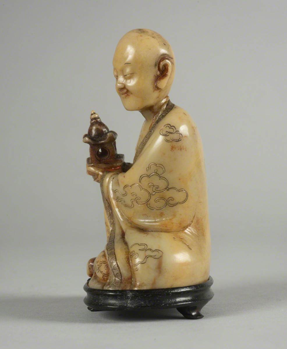 Seated Luohan (Disciple of the Buddha) Holding a Model of a Pagoda