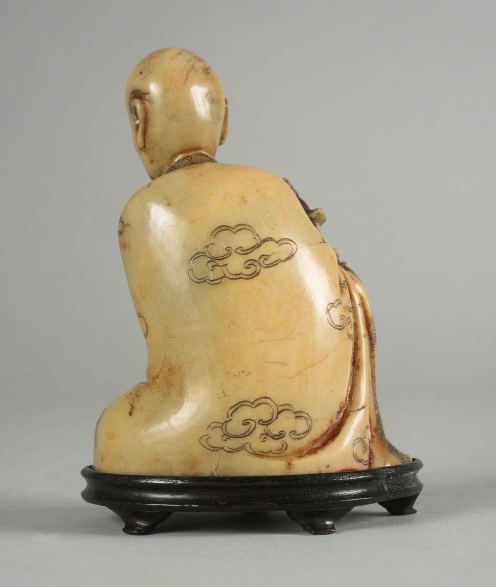 Seated Luohan (Disciple of the Buddha) Holding a Model of a Pagoda