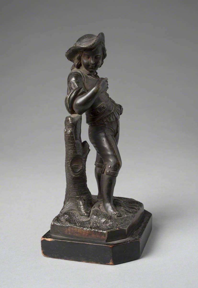 Figure of a Boy Holding a Fish