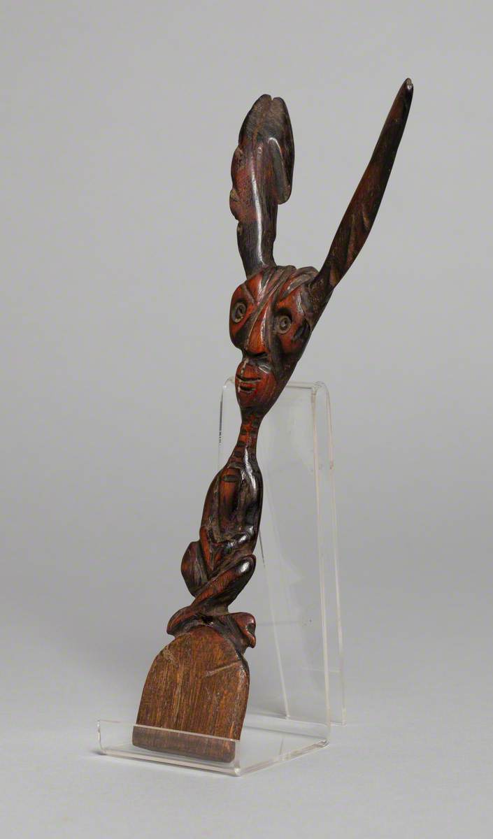 Stylised Figure Seated Cross-Legged with Large Ears