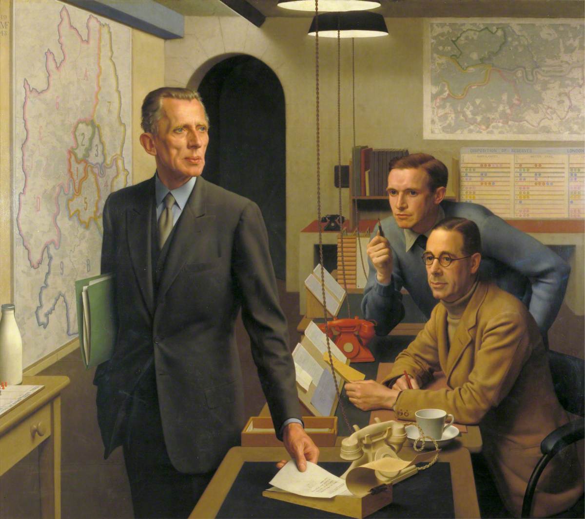 Sir Ernest Gowers (1880–1966), KCB, KBE, Senior Regional Commissioner for London, Lieutenant Colonel A. J. Child, OBE, MC, Director of Operations and Intelligence, and K. A. L. Parker, Deputy Chief Administrative Officer, in the London Regional Civil Defence Control Room