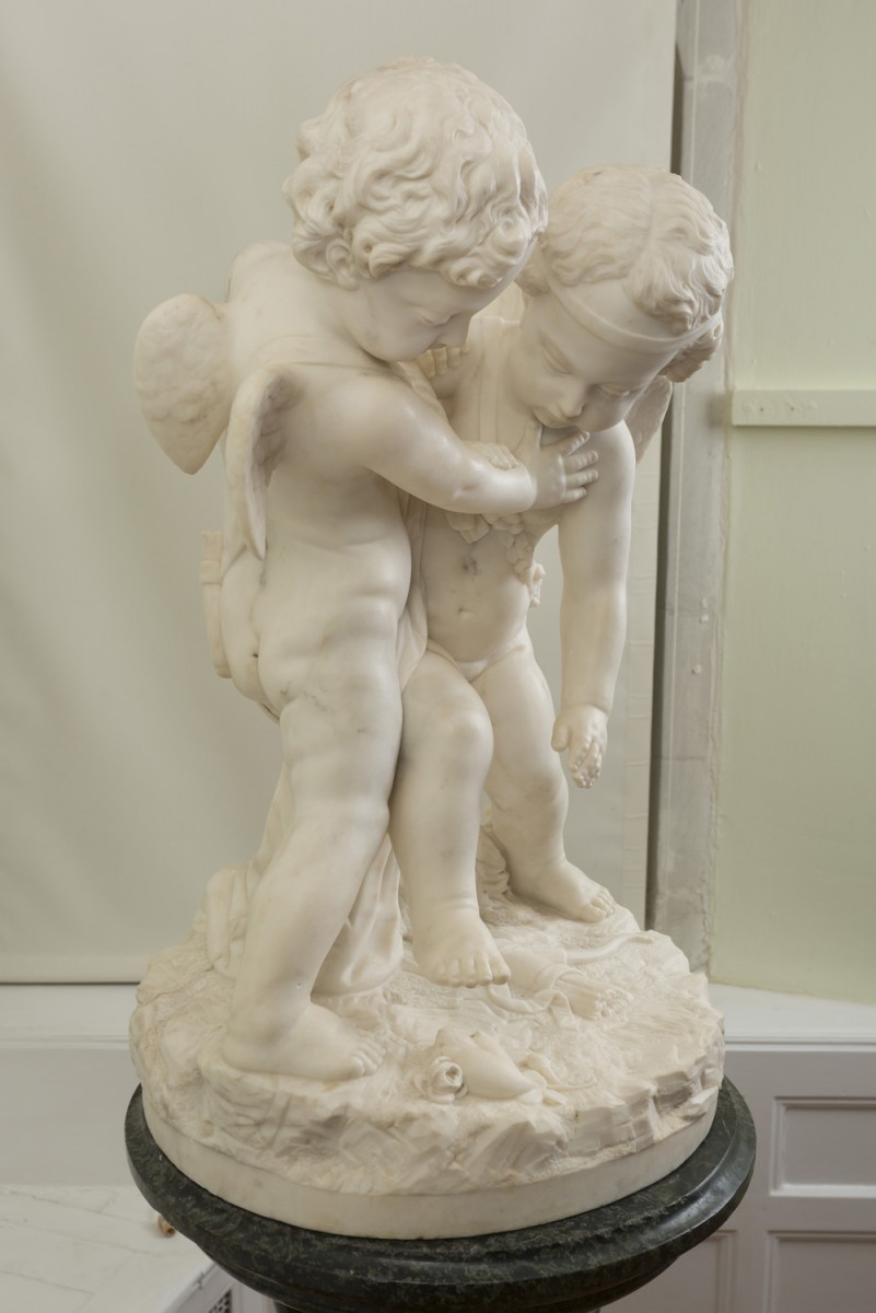 Cupids Fighting for a Human Heart