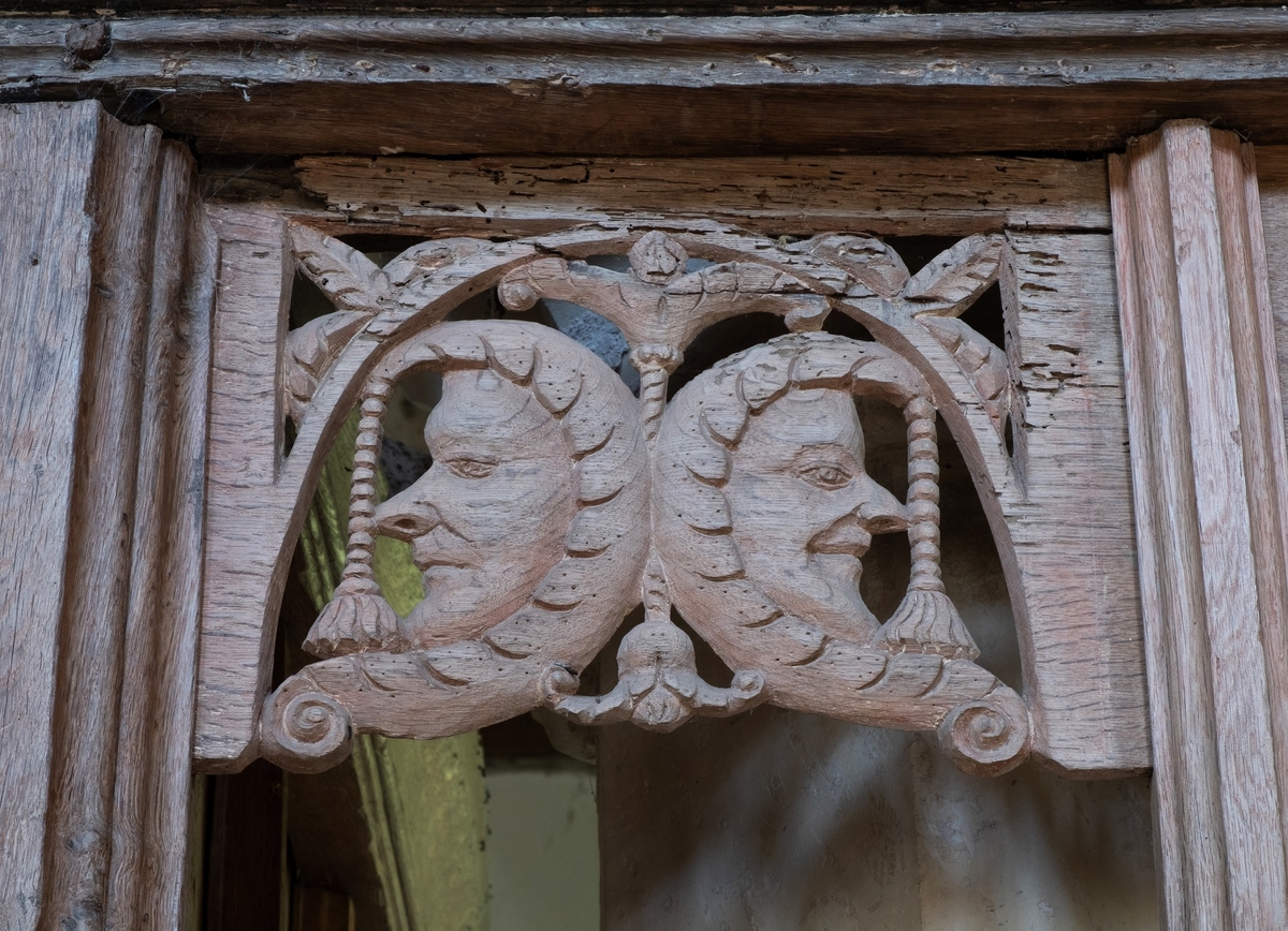 Carved Screen with Heads