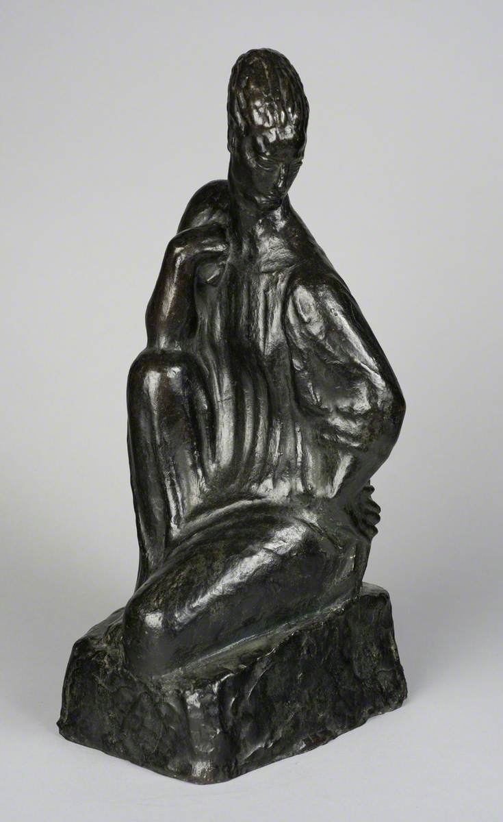 Seated Female Figure*