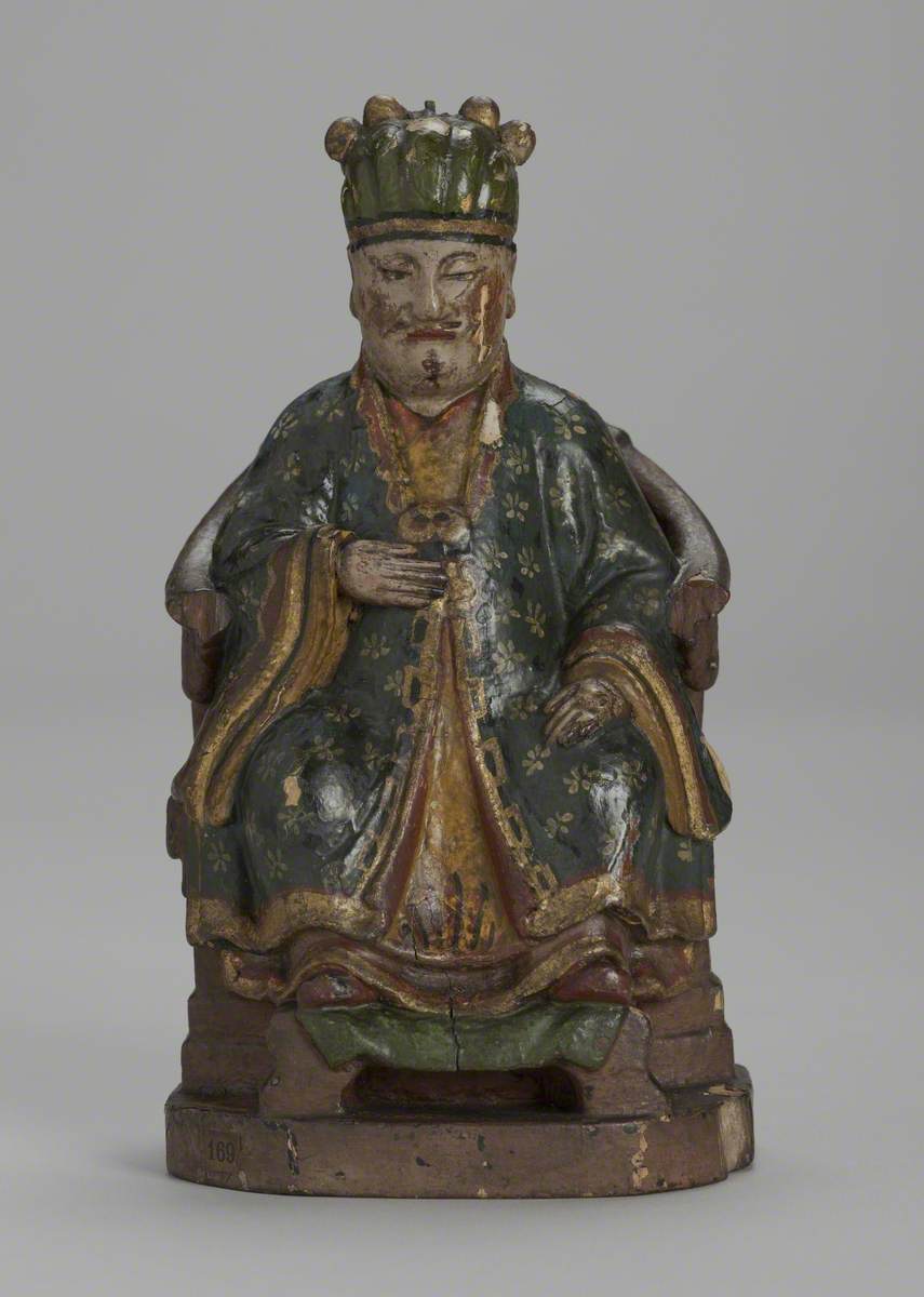 Seated Male Joss Figure