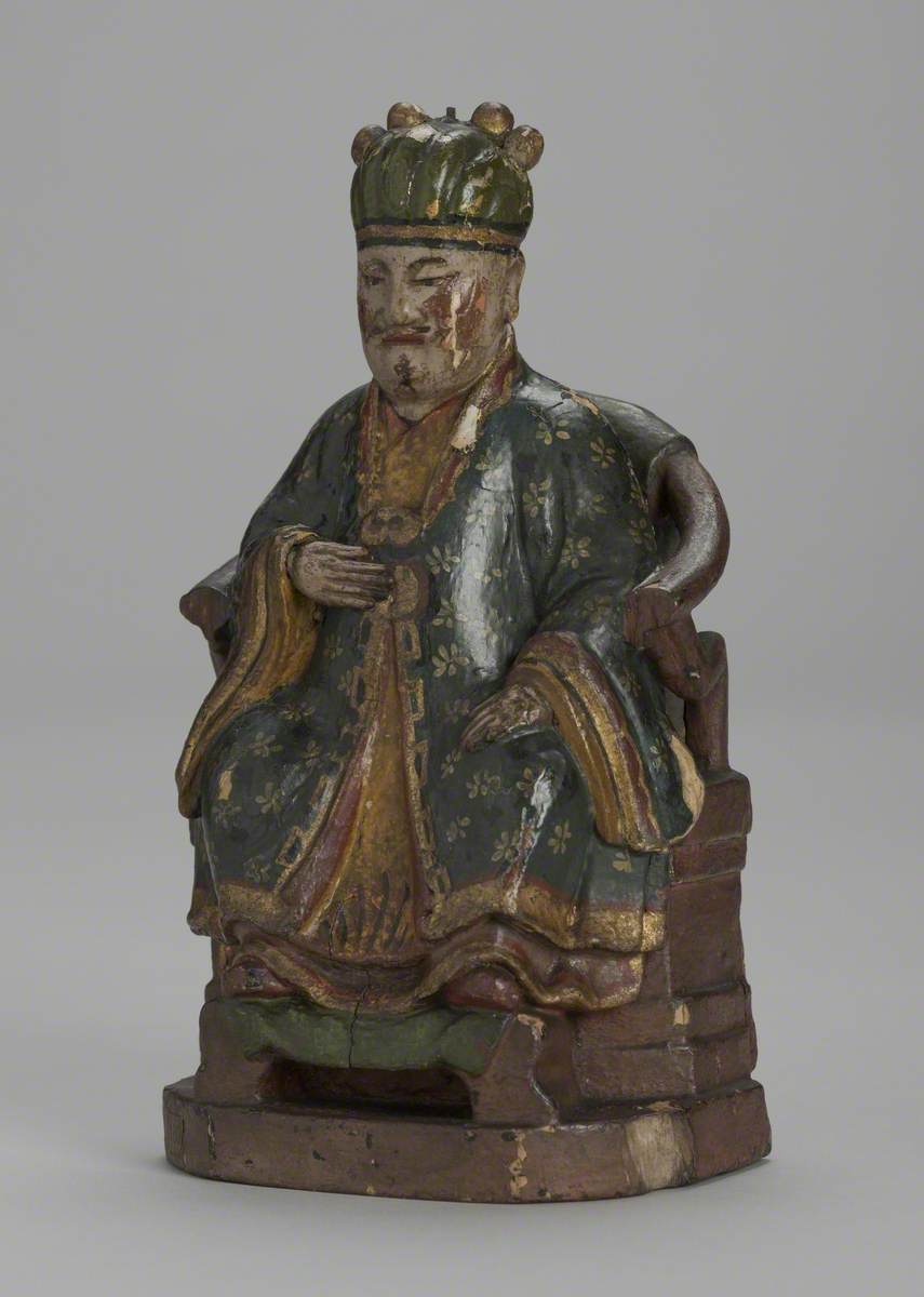 Seated Male Joss Figure