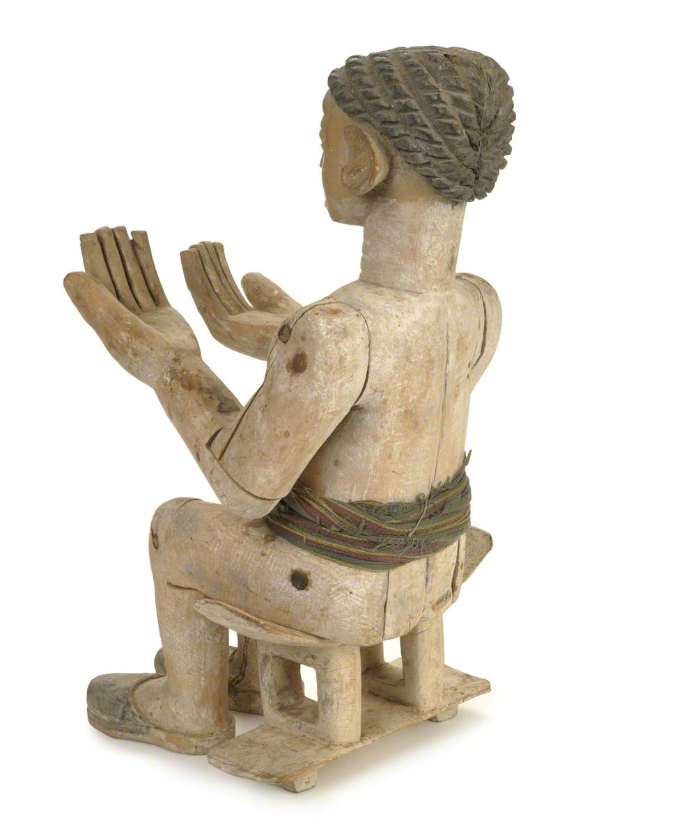 Female Figure Seated on a Throne