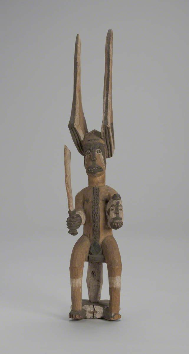 Ikenga Figure holding Severed Head