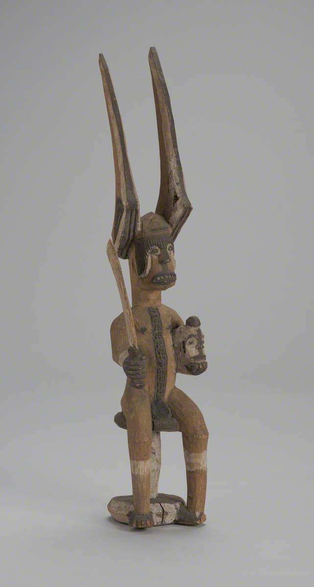Ikenga Figure holding Severed Head