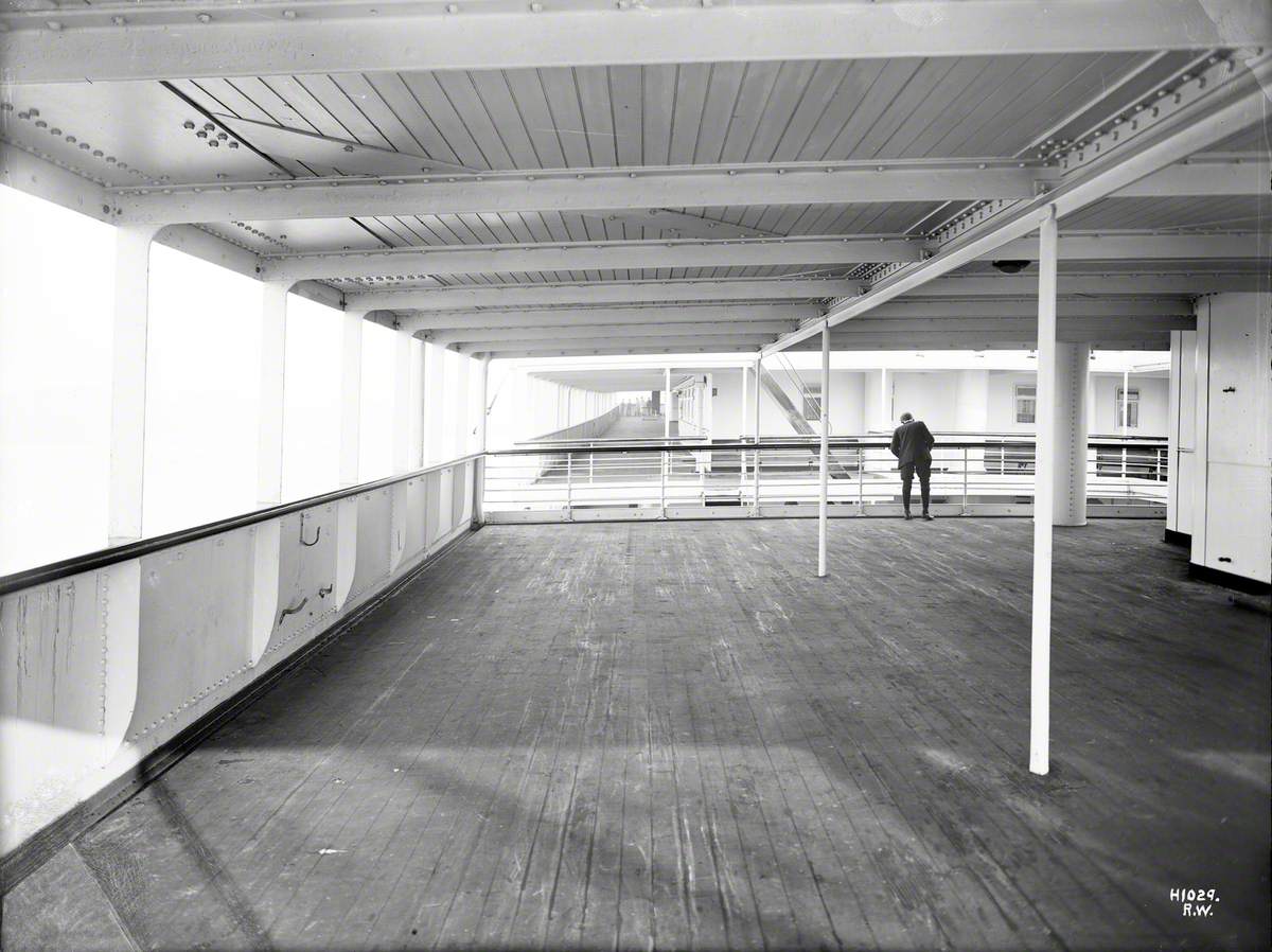 View forward from second class after promenade deck to first class promenade deck portside