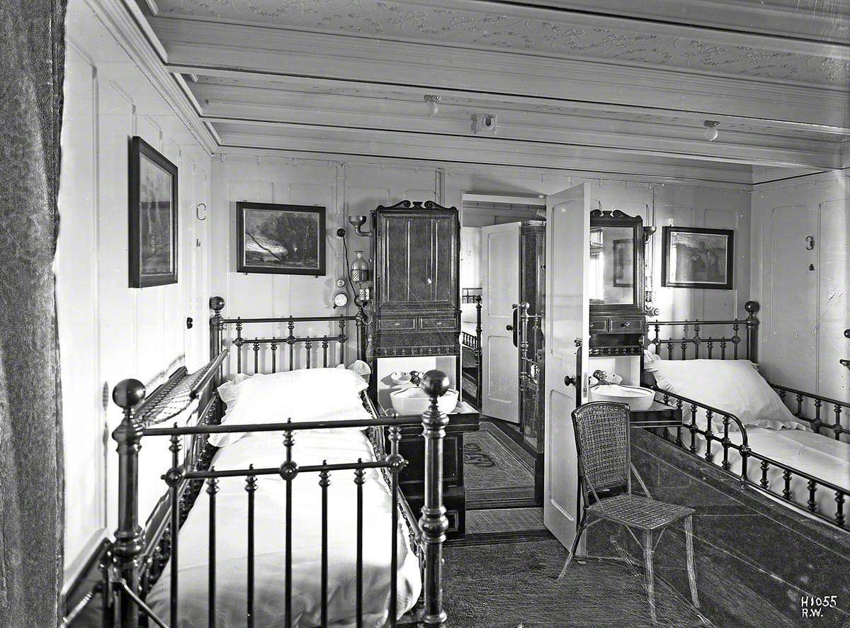 First class double state room and view of others across passageway