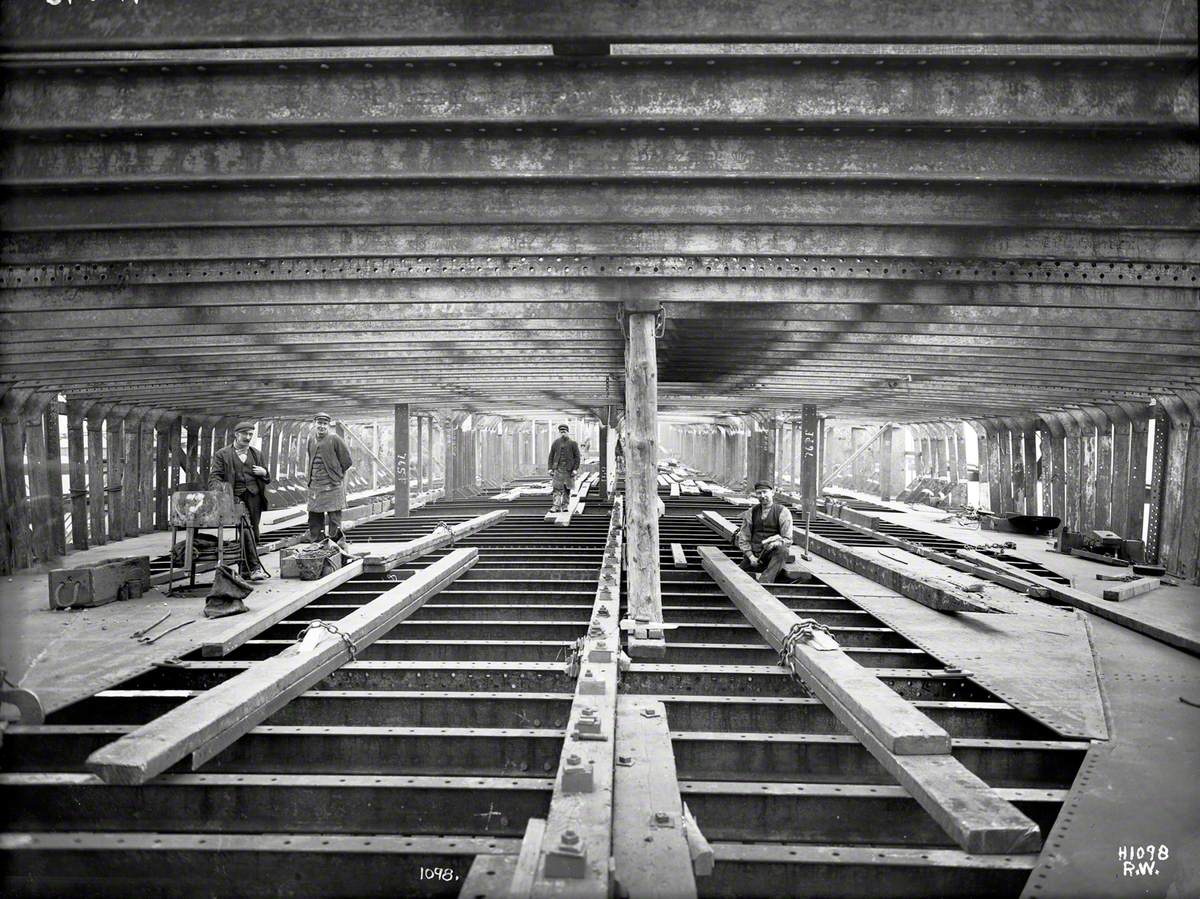 Internal views showing initial laying of plates on tank-top/main deck beams