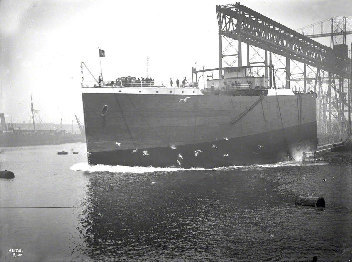 Launch, entering water bow first (port bow view)