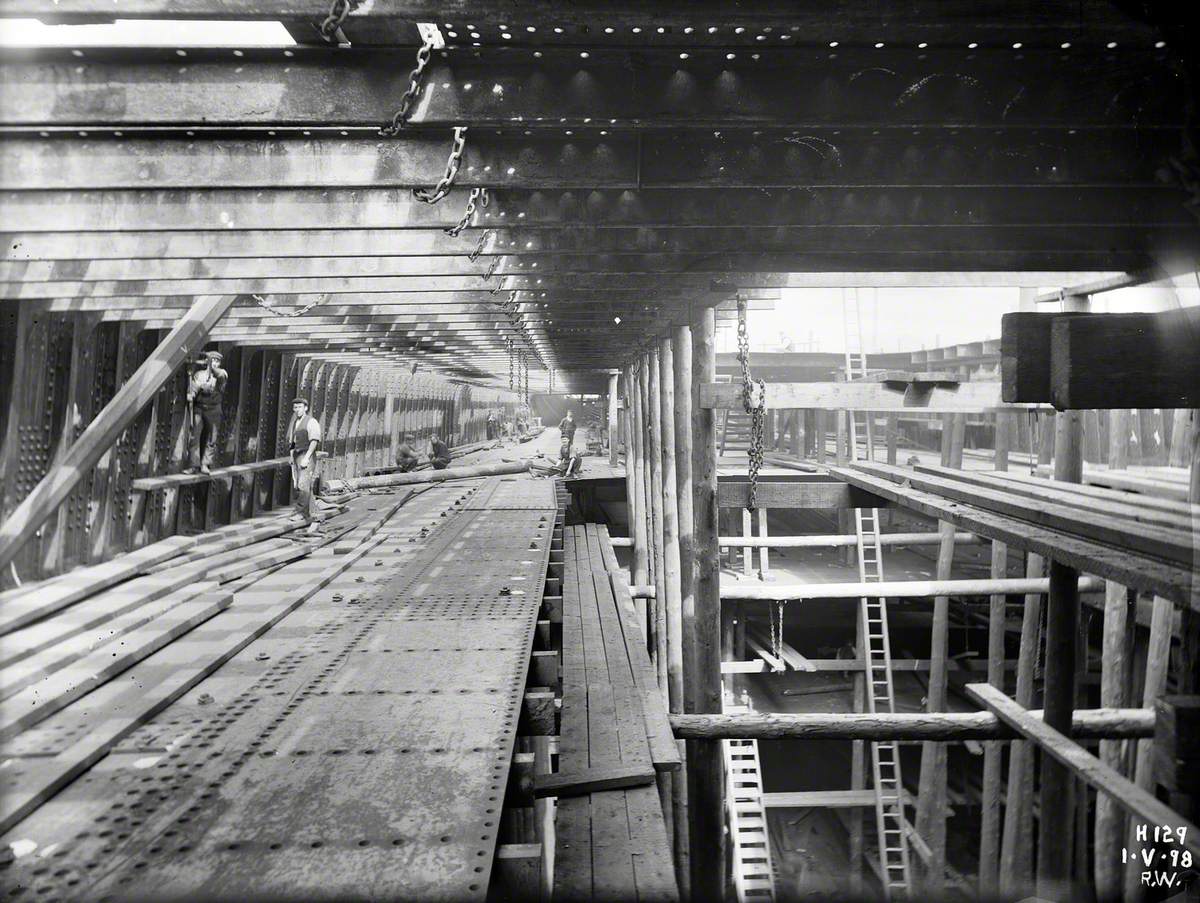 Plating main deck within the hull, view aft