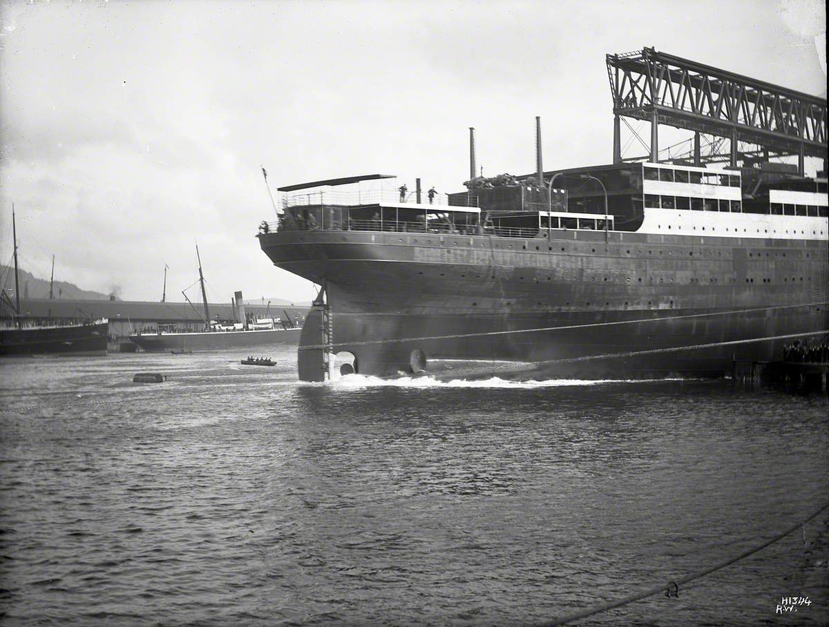 Launch; starboard stern view entering water