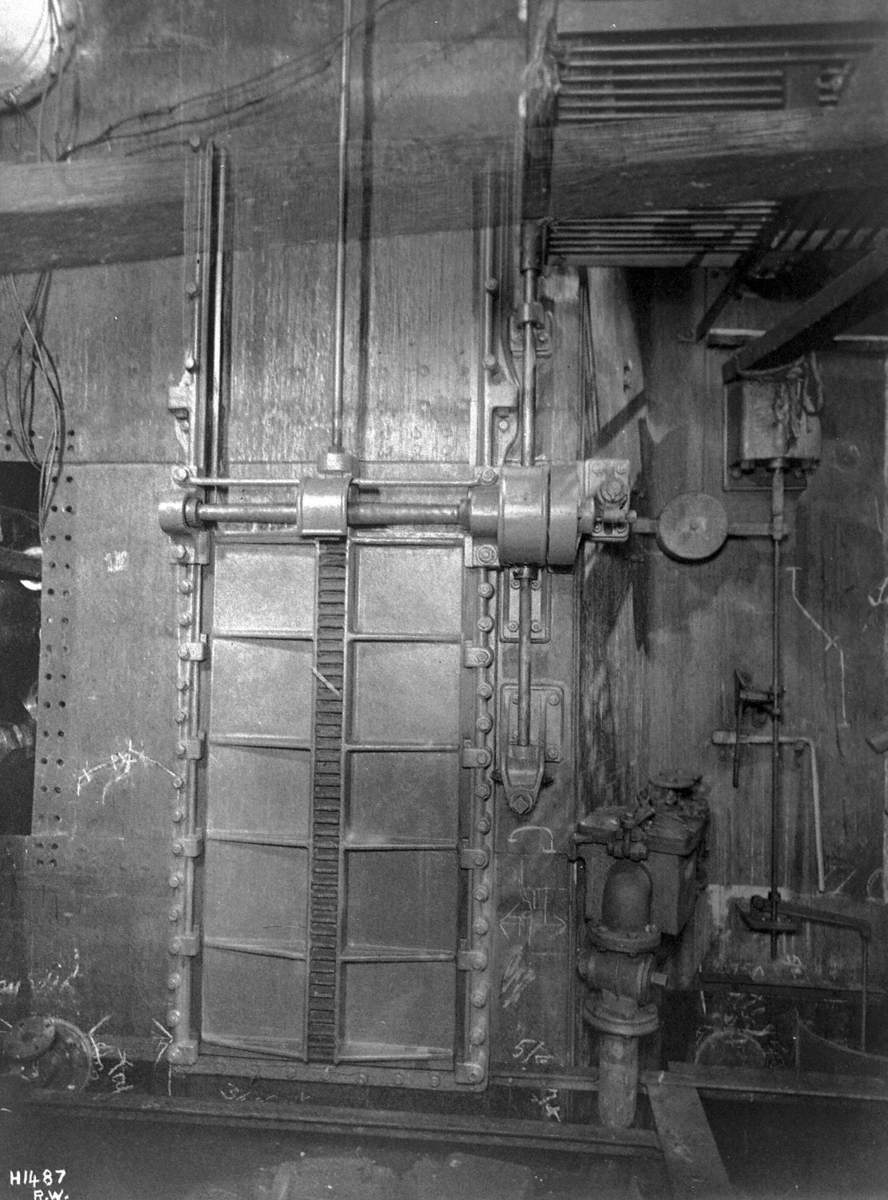 Watertight door in lowered closed position during outfitting