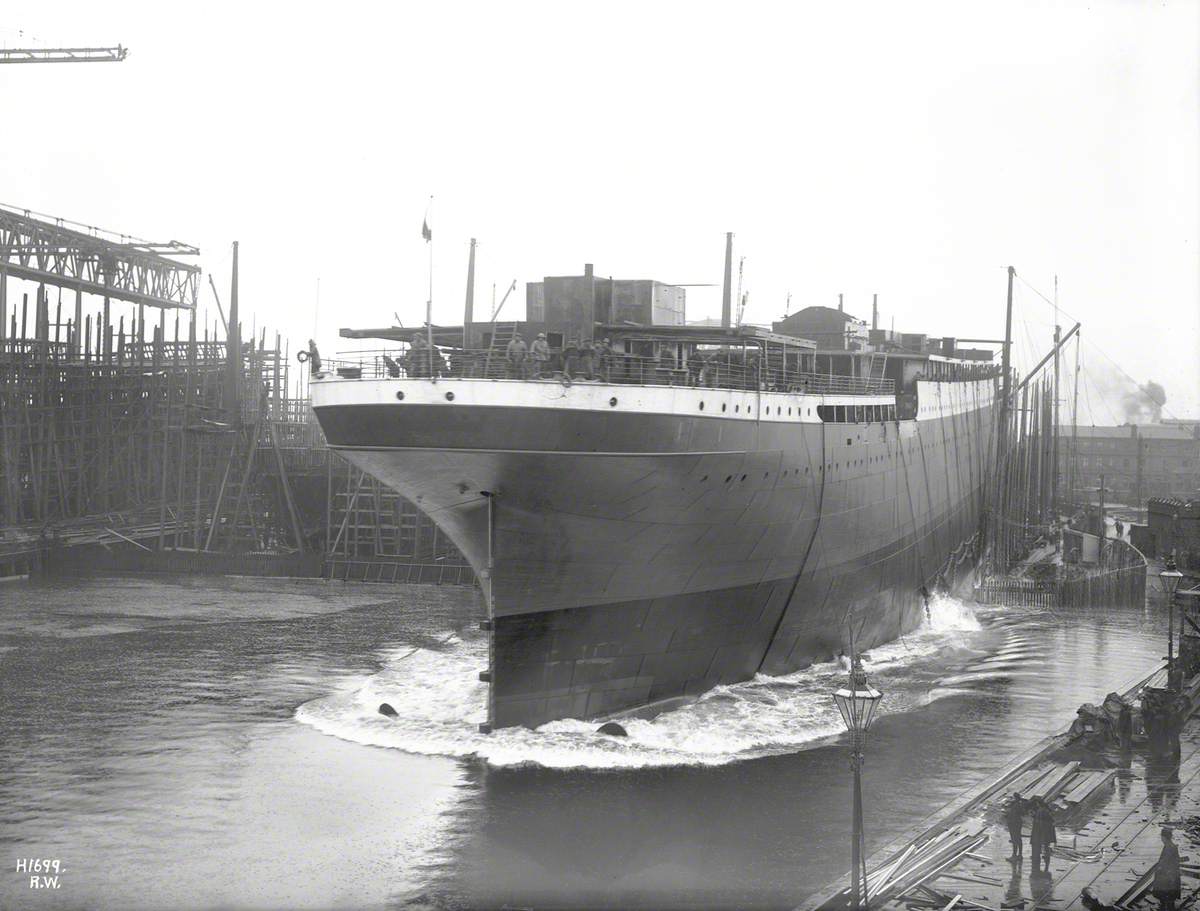 Launch; starboard stern view entering water