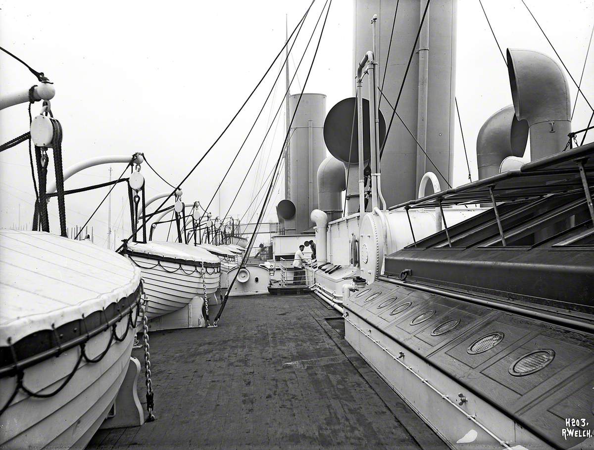 Port boat deck, funnels and engine room skylights, view forward towards bridge