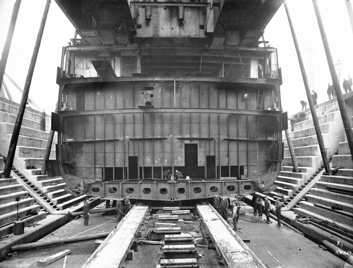 Sequence of views of ship in Alexandra Graving Dock, showing operation to lengthen hull by 54 feet