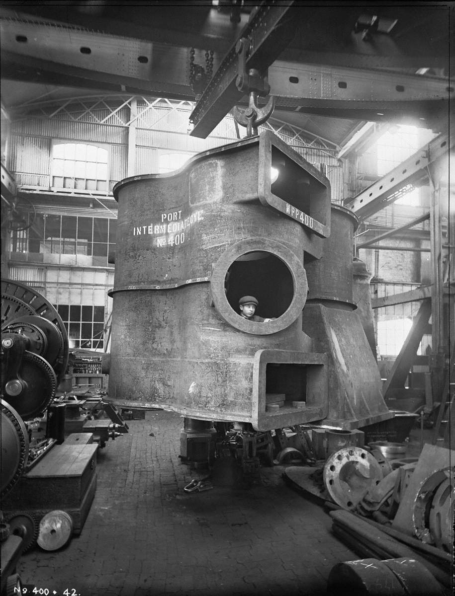 Port intermediate cylinder casting, with figure, in Engine Works shop