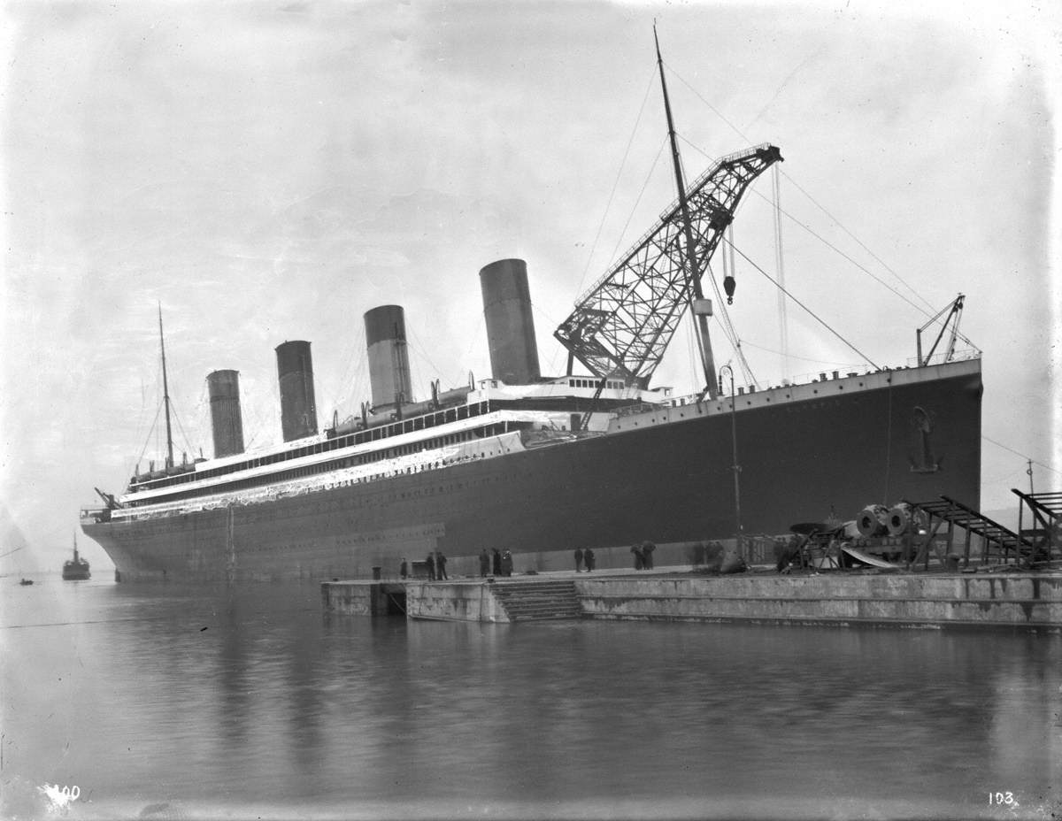 Starboard bow 3/4 profile during outfitting with four funnels in position