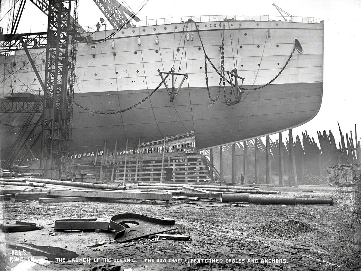 Starboard bow profile immediately prior to launch, with slung cables and anchors.